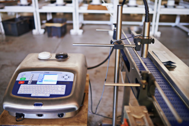 Closeup shot of a scale in a packaging and distribution warehouse